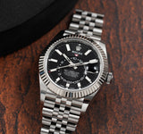 https://cdn.shopify.com/s/files/1/0312/1640/2565/files/rolex-sky-dweller-326934-blkind-multiple-1_jpg.jpg?v=1758215536