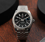 https://cdn.shopify.com/s/files/1/0312/1640/2565/files/rolex-sky-dweller-326934-blkind-multiple-2_jpg.jpg?v=1758215536