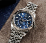 https://cdn.shopify.com/s/files/1/0312/1640/2565/files/rolex-sky-dweller-326934-bluind-powg22c-multiple-1_jpg.jpg?v=1761935956