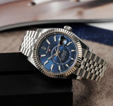 https://cdn.shopify.com/s/files/1/0312/1640/2565/files/rolex-sky-dweller-326934-bluind-powg22c-multiple-2_jpg.jpg?v=1761935956